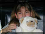 Krista with her stuffed animal.